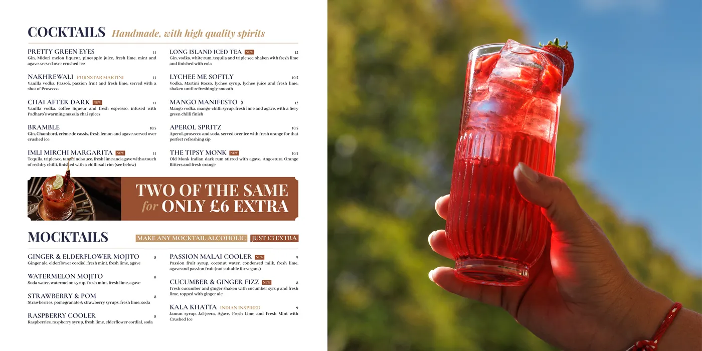 Drinks menu spread: cocktails and mocktails opposite a strawberry cooler held up against the sky