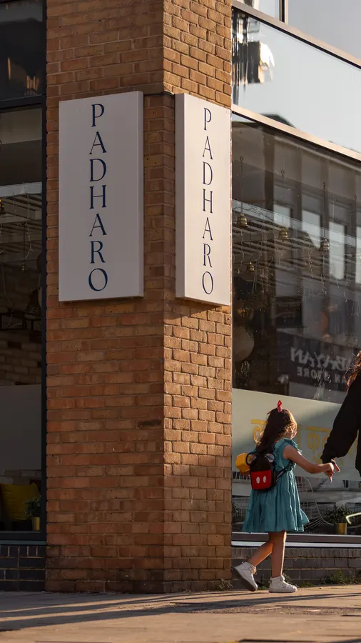 Padharo's name running down the brick pillar by the front door on East Street
