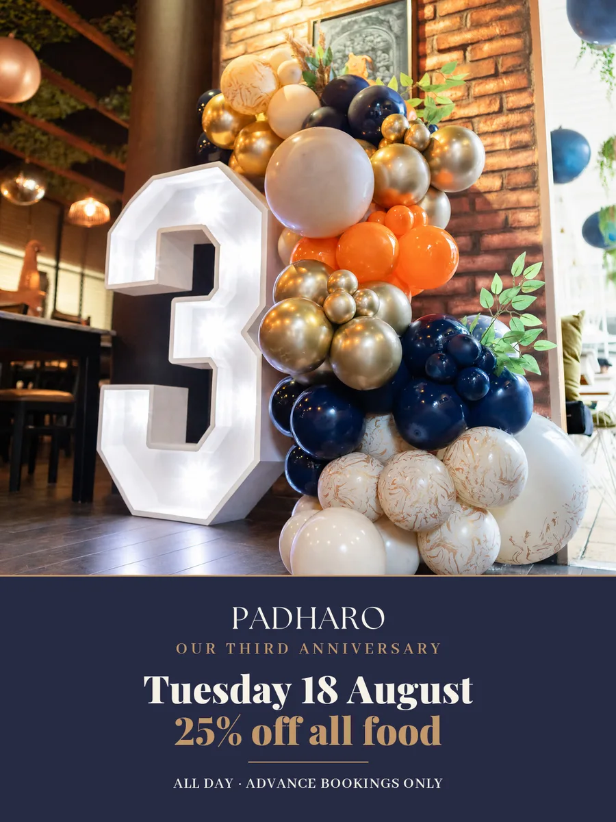 Third anniversary post: a balloon arch round a giant number three, 25 per cent off all food on Tuesday 18 August