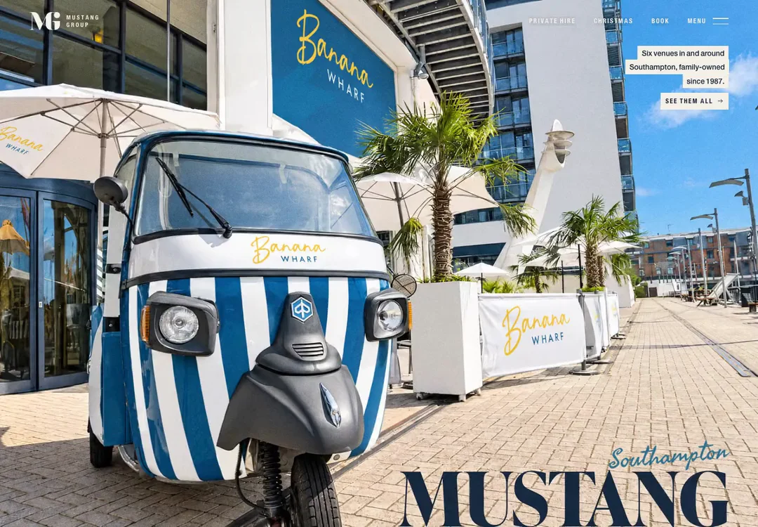 A recorded tour of the new Mustang Group site on a desktop screen, from the Banana Wharf tuk-tuk down through the venues